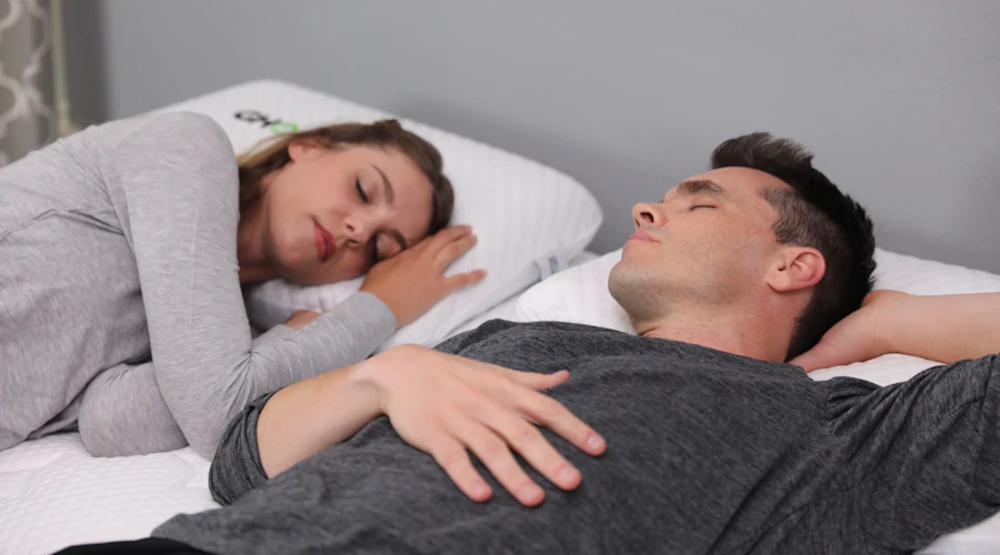 A couple falls asleep on their GhostBed mattress
