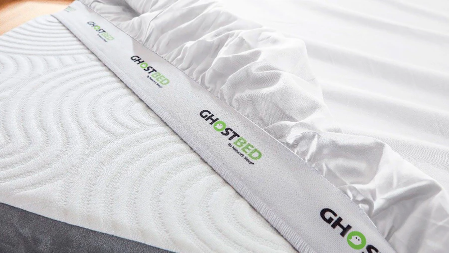Our signature GhostGrip elastic band keeps your mattress topper in place