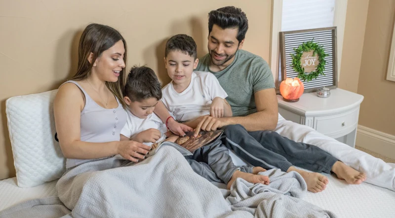 Family with kids on a GhostBed mattress