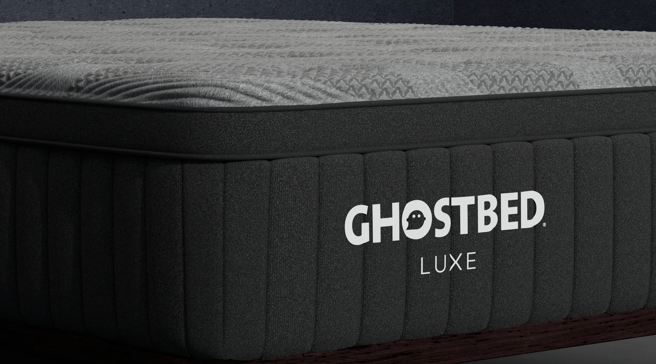 Corner of the GhostBed Luxe memory foam mattress, showcasing the premium quality.
