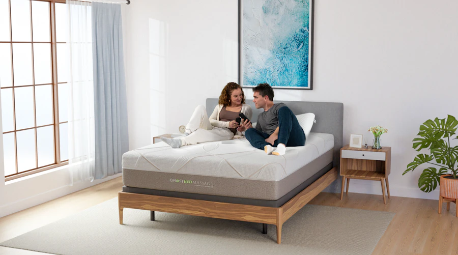 Couple relaxing on a GhostBed Massage mattress