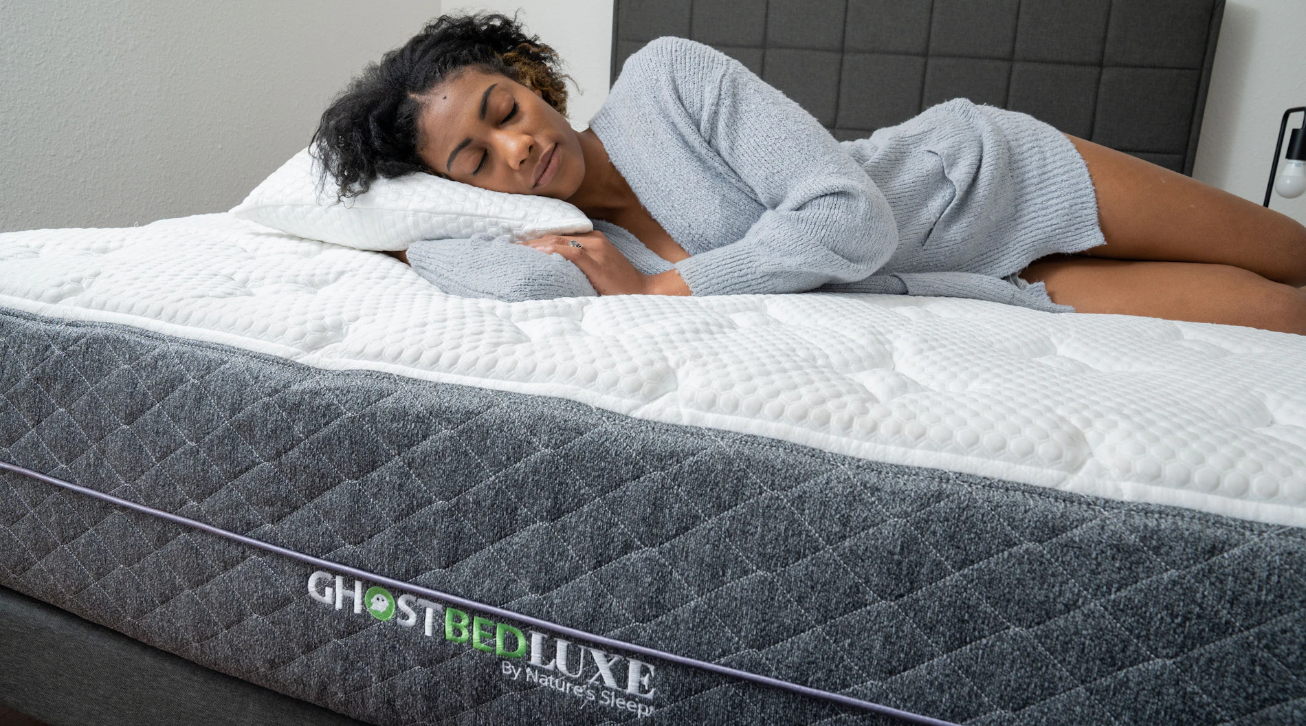 Woman sleeping on side on GhostBed Luxe Mattress